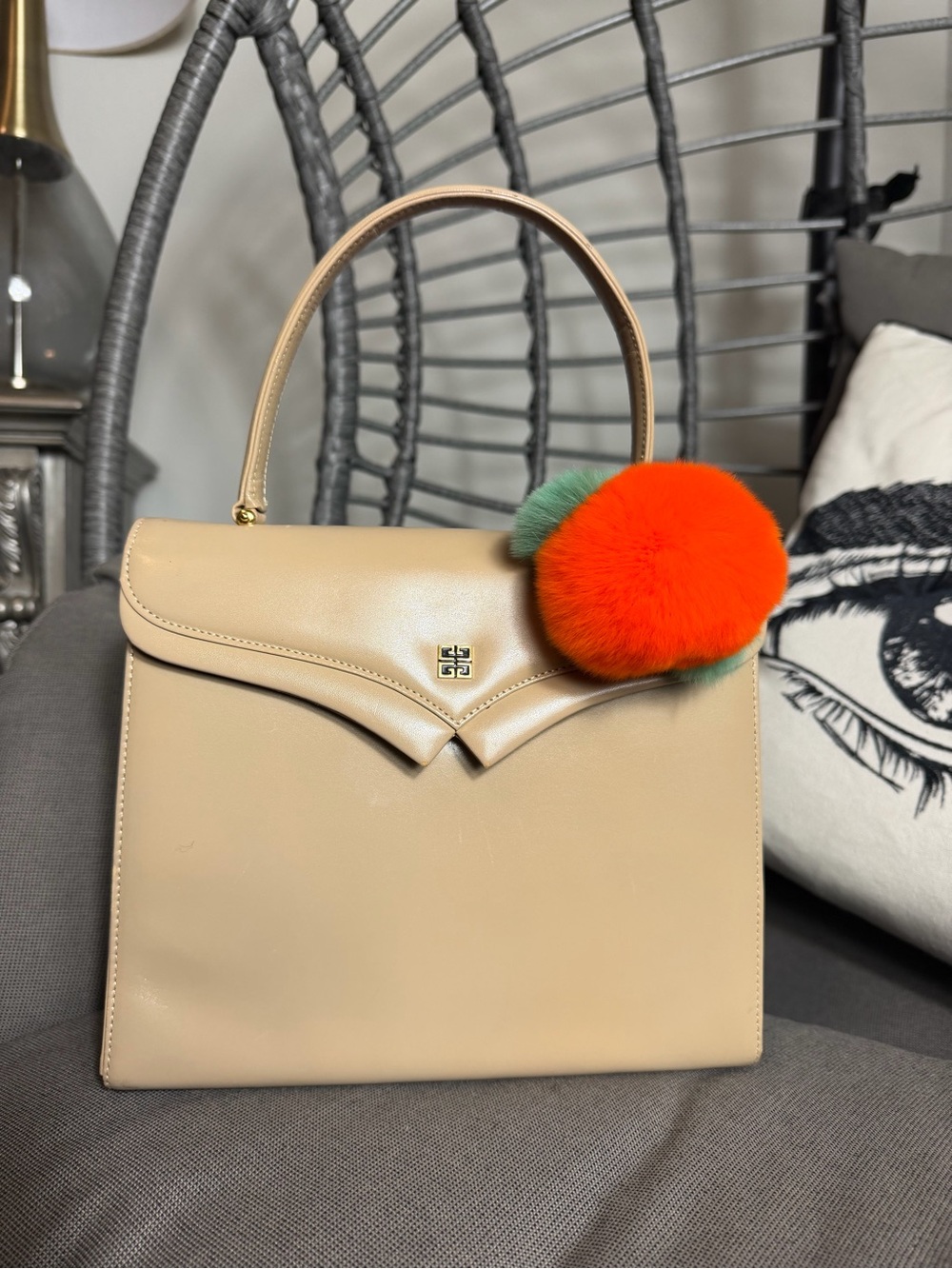 Vintage Givenchy Beige Top-Handle Leather Satchel with Pom Pom Accent.